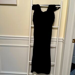 This is a  maxi brand new never one that lands just at the ankle.